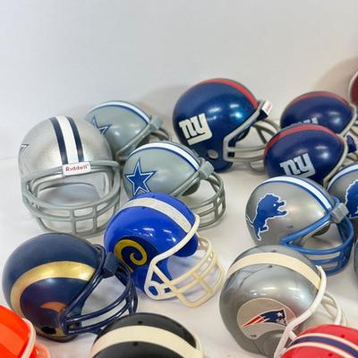 LOT 65: Sports Memorabilia Collection: Slim Jim Glass Mugs, Avon Stein, Riddell Mini Helmets & More