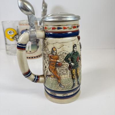 LOT 65: Sports Memorabilia Collection: Slim Jim Glass Mugs, Avon Stein, Riddell Mini Helmets & More