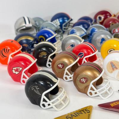 LOT 65: Sports Memorabilia Collection: Slim Jim Glass Mugs, Avon Stein, Riddell Mini Helmets & More