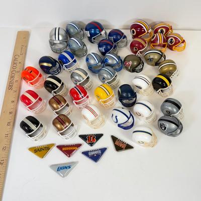 LOT 65: Sports Memorabilia Collection: Slim Jim Glass Mugs, Avon Stein, Riddell Mini Helmets & More
