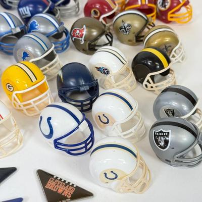 LOT 65: Sports Memorabilia Collection: Slim Jim Glass Mugs, Avon Stein, Riddell Mini Helmets & More