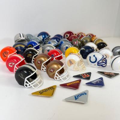 LOT 65: Sports Memorabilia Collection: Slim Jim Glass Mugs, Avon Stein, Riddell Mini Helmets & More