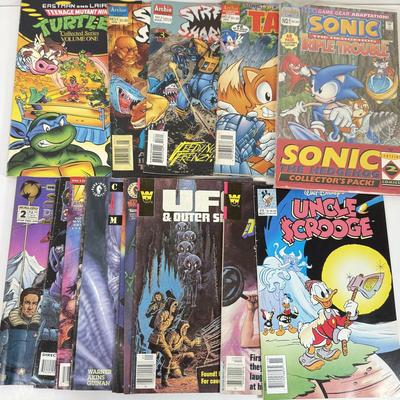 LOT 78: Collection of Vintage Comics: Disney's Uncle Scrooge, Sonic & Tails, Street Sharks, TMNT & More