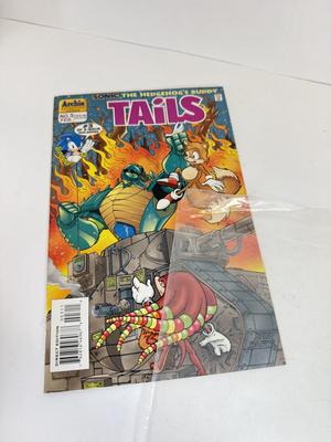 LOT 78: Collection of Vintage Comics: Disney's Uncle Scrooge, Sonic & Tails, Street Sharks, TMNT & More