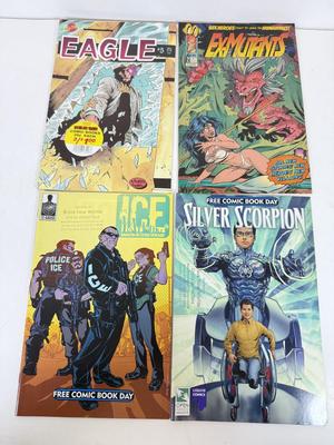 LOT 89: "Free Comic Book Day" Comics: Valiant, Malibu: Magnus, Silver Scorpion