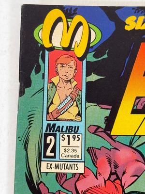 LOT 89: "Free Comic Book Day" Comics: Valiant, Malibu: Magnus, Silver Scorpion