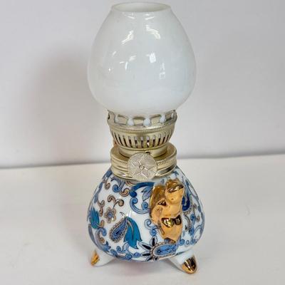 LOT 104: Antique Daguerreotype Photo, Lefton China Mini Lamp & Curved Glass Hawaiian Flora 24kt Gold Wall Decor