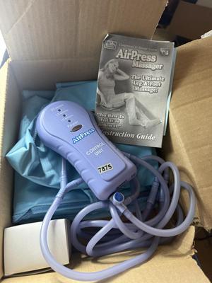 Air press massager-new in box
