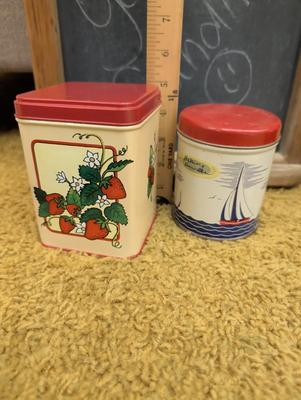 Misc items including old tin cans, chalkboard, teapot