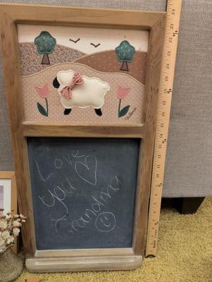 Misc items including old tin cans, chalkboard, teapot