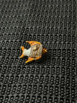 gold-toned and enamel fish brooch pin with rhinestone accents.