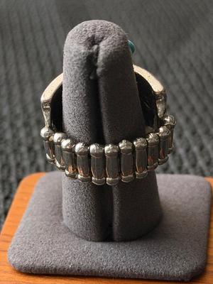 Silver tone adjustable ring with turquoise and brown triangles design