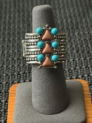 Silver tone adjustable ring with turquoise and brown triangles design