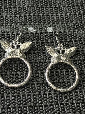 white rhinestone butterfly earrings.