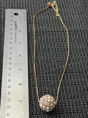Gold tone rhinestone ball pendant necklace