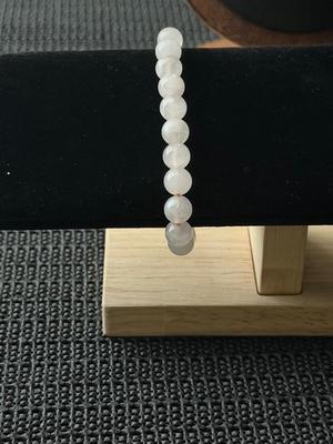 rose quartz type beaded necklace and bracelet set.