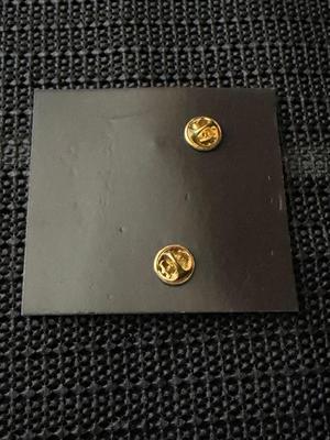 Havana Club rum bottle and domino tile enamel pin set.