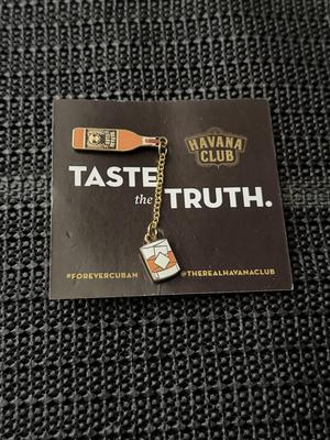 Havana Club rum bottle and domino tile enamel pin set.