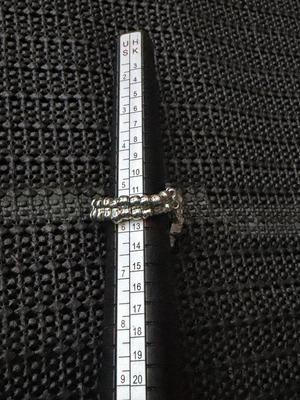 blue ring, featuring a square-cut Montana Blue gem surrounded by white rhinestones in silver pronged fittings.