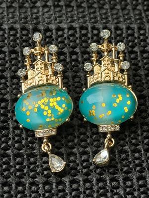 Gold tone dangle castle fashion earrings