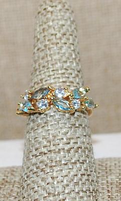 Size 7 ½ Staggered Carolina Blue Marquise Cut Stones & Round Clear Round Stone Accents on a Gold Tone Band (3.0g)