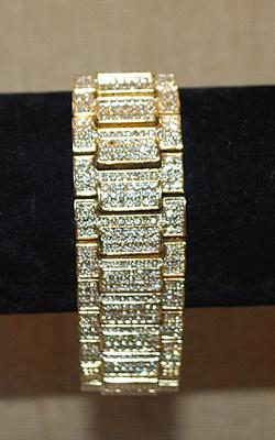 Beautiful Gold Tone JEWEL STUDDED BRACELET (2¼" Opening) with Half Infinity Clear Stone Segments & Overlapping Closure