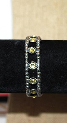 Pretty Yellow Green Round Stones Elastic BRACELET (2¼" Opening) with Silver Tone Globes & Barrels Accent CHAIN