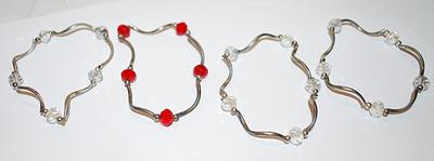 Collection of 4 Curved Wire Elastic BRACELETS (2¼" Opening) with Clear/Red Beads