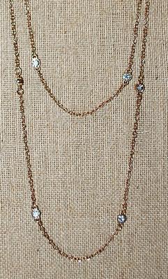 Long WRAP-AROUND 4 Strand NECKLACE - Marked "EXPRESS" - with Cupped Round Clear Stone Accents on a Gold Tone Chain and Lobster...