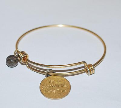 "May All Your Wishes Come True" BRACELET (2¼" Opening) with Accent Globe on a Gold Tone Setting