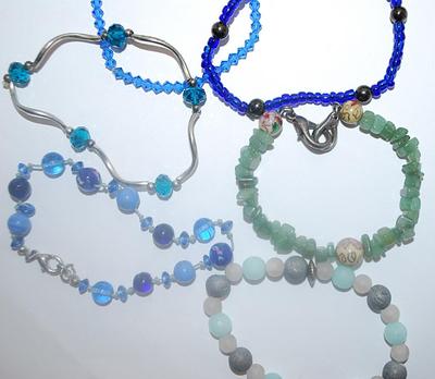 Collection of 6 Elastic BRACELETS (2½" to 3¾" Opening) in Blues, Greens and Silver Tone Curves