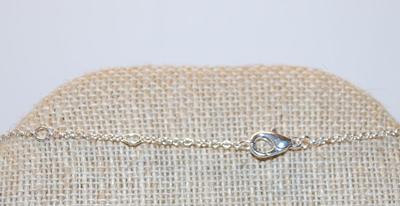 Single Center Stone Cross PENDANT (1½" x 1") with Lots of Clear Stone Accent Chips on a Silver Tone Adjustable Necklace Chain...