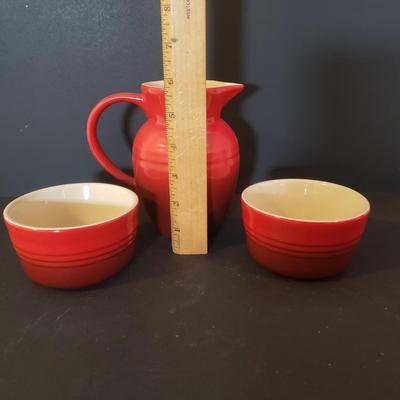 LOT 88K: Le Creuset Small Red Pitcher with Ramekins