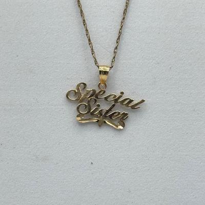 LOT 140J: 14kt Gold “Special Sister” Pendant (0.86g) on 20” Gold Fill Chain
