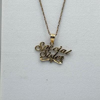 LOT 140J: 14kt Gold “Special Sister” Pendant (0.86g) on 20” Gold Fill Chain