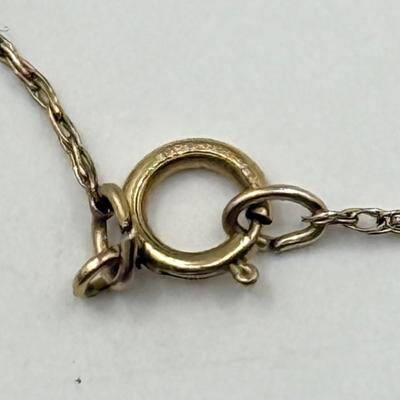 LOT 140J: 14kt Gold “Special Sister” Pendant (0.86g) on 20” Gold Fill Chain