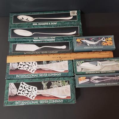 LOT 153L: Assorted New in Box Intl Silver Co Silverplate Serving Utensils & More