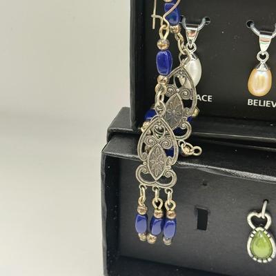 LOT 180: Charms, Large Blue Stone Ring, Loft "Pearl" Earrings & More