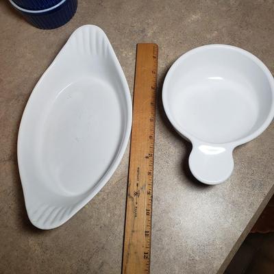 LOT 190K: Fiesta Blue Ice Lip Pitcher with Collection of Dishes & Bakeware