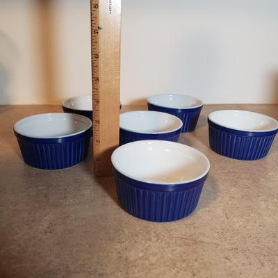 LOT 190K: Fiesta Blue Ice Lip Pitcher with Collection of Dishes & Bakeware