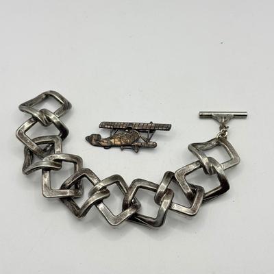 LOT 220J: Heavy Link Denmark Bracelet & Prop Plane Pin