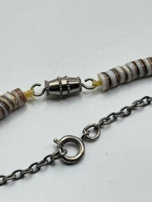 LOT 227J: Turquoise Necklaces, New Tribal Earrings & More featuring a Zuni-style heishi fetish necklace featuring bird carvings