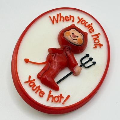LOT 238J: 1980s Hallmark "When You're Hot, You're Hot!" Devil Pin, Pull String Plastic Pumpkin w/ Glasses & More