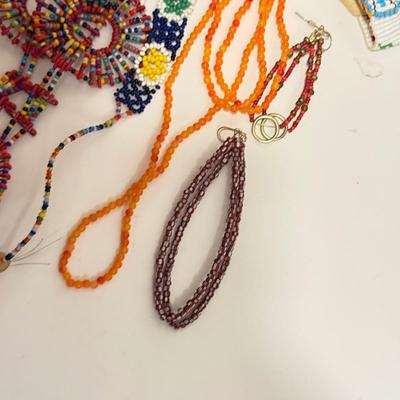 LOT 240L: Large Collection of Beaded Necklaces