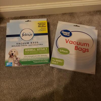 LOT 252M: Bissell 12 Amp Upright Vacuum with Lots of Extra Bags