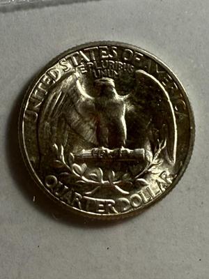 1945-P UNCIRCULATED CONDITION WASHINGTON SILVER QUARTER AS PICTURED.