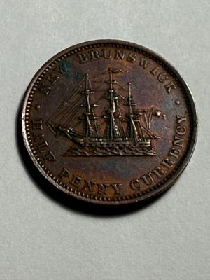 1854 Canadian Half Penny New Brunswick Copper Token in Circulated Condition as Pictured.