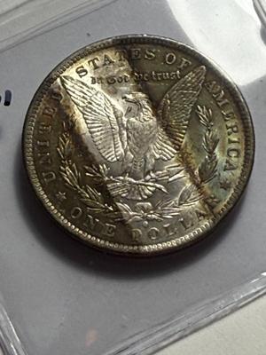 1884-O MS62 QUALITY TAPE LINE TONED MORGAN SILVER DOLLAR COIN #23 AS PICTURED.