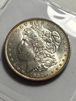 1884-O MS62 QUALITY TAPE LINE TONED MORGAN SILVER DOLLAR COIN #23 AS PICTURED.