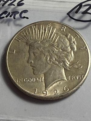 1926-P CIRCULATED CONDITION PEACE SILVER DOLLAR COIN #12 AS PICTURED.